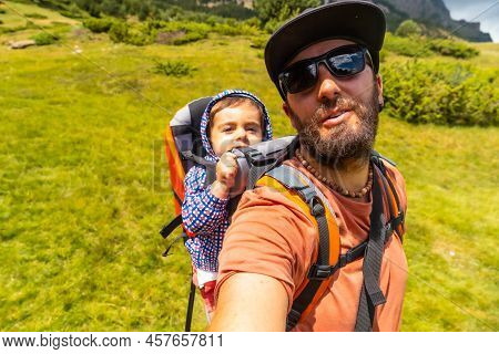 Selfie Of A Father And His Son Climbing The Mountain To The Piedrafita Arch, Alto Gallego, Huesca