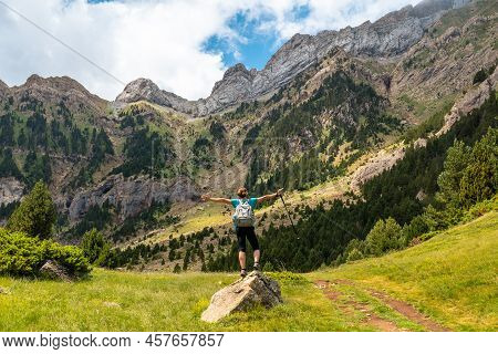 A Young Woman Climbing The Mountain To The Piedrafita Arch, Alto Gallego, Huesca, Aragon