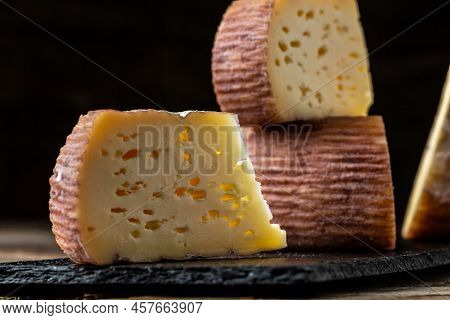 Group Of Natural Mountain Cheeses Made In The Traditional Craft Cheese From Cows And Goats Milk.