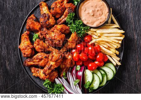 Spicy Roast Chicken Wings With French Fries, Tomatoes, Cucumber, Red Onion And Thousand Islands Dip 