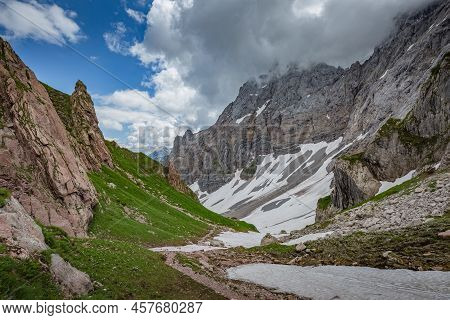 Mountain Hiking Trail Road. Grey Sky Before Thunderstorm. Between Italy And Austria: Near Volaia Lak