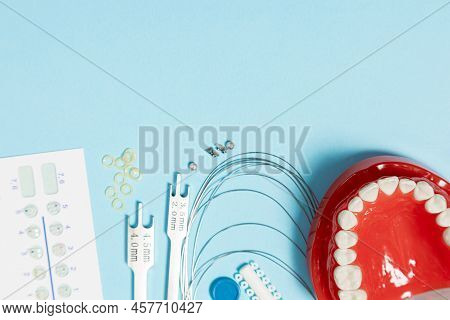 A Set Of Special Tools For An Orthodontist To Install Braces For A Patient. Orthodontic Arcs, Ligatu
