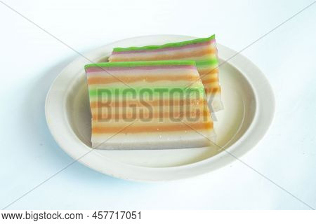 Lapis Cake Or Roti Lapis Or Layer Cake Or Lapis Legit Served In Little Plate Isolated On White Backg