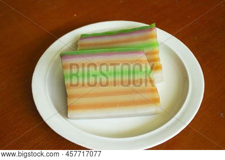 Lapis Cake Or Roti Lapis Or Layer Cake Or Lapis Legit Served In Little Plate Isolated On White Backg