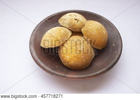Brown Sugar Or Java Sugar Or Palm Sugar Or Gula Jawa Isolated On White Background. Top View. Flat La