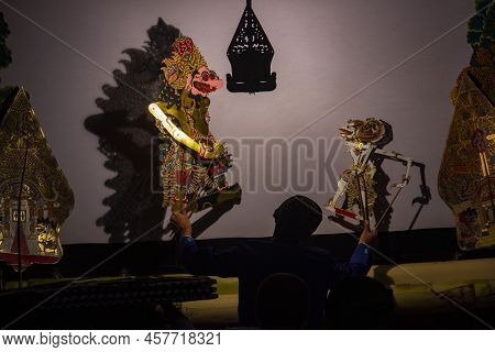 Wayang Kulit Or Shadow Puppets From Java, Indonesia Puppet Show By Dalang Or Puppeteer . Wayang Made