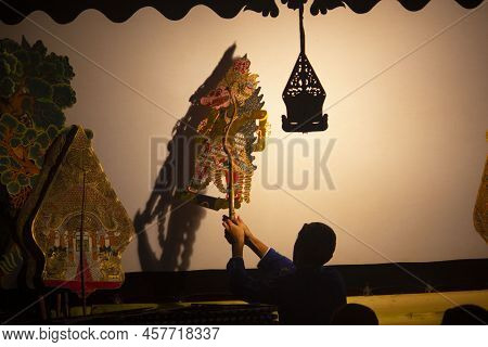 Wayang Kulit Or Shadow Puppets From Java, Indonesia Puppet Show By Dalang Or Puppeteer . Wayang Made