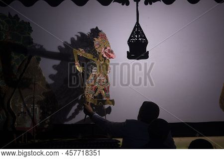 Wayang Kulit Or Shadow Puppets From Java, Indonesia Puppet Show By Dalang Or Puppeteer . Wayang Made