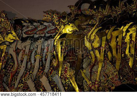 Wayang Kulit Or Shadow Puppets From Java, Indonesia Puppet Show By Dalang Or Puppeteer . Wayang Made