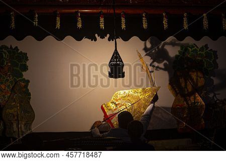 Wayang Kulit Or Shadow Puppets From Java, Indonesia Puppet Show By Dalang Or Puppeteer . Wayang Made