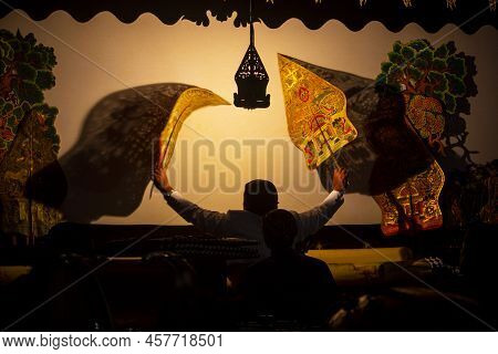 Wayang Kulit Or Shadow Puppets From Java, Indonesia Puppet Show By Dalang Or Puppeteer . Wayang Made