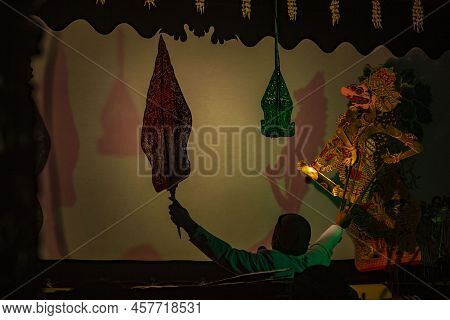 Wayang Kulit Or Shadow Puppets From Java, Indonesia Puppet Show By Dalang Or Puppeteer . Wayang Made