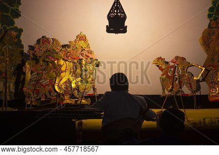 Wayang Kulit Or Shadow Puppets From Java, Indonesia Puppet Show By Dalang Or Puppeteer . Wayang Made