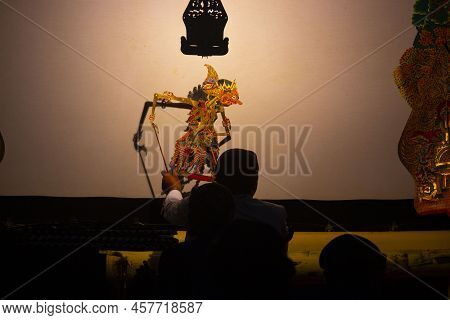 Wayang Kulit Or Shadow Puppets From Java, Indonesia Puppet Show By Dalang Or Puppeteer . Wayang Made
