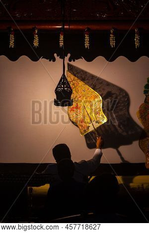 Wayang Kulit Or Shadow Puppets From Java, Indonesia Puppet Show By Dalang Or Puppeteer . Wayang Made