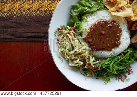 Nasi Pecel Or Sego Pecel Is Traditional Javanese Rice Dish Of Steamed Rice With Vegetable Salad, Pea