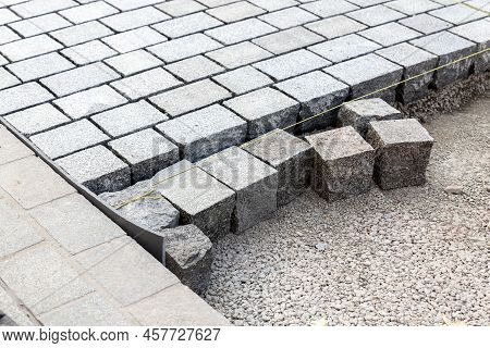 Construcion Site Of Pavement Granite Cobblestone Road In Old City Center Installation Or Renovation 
