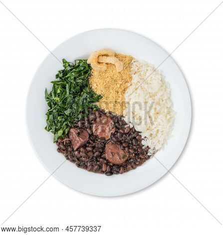 Typical Brazilian Feijoada With Rice, Farofa, Kale And Cracklings On A Plate Isolated Over White Bac