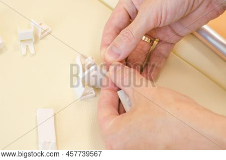 Assembly Of Roller Blinds. Male Hands Are Assembling Roller Blinds, Close-up.