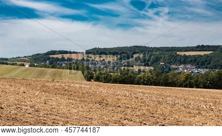View Over The German Countryside In Rhineland-palatinate With Plowed Agriculture Fields , Germanny