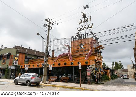 Gramado, Rs, Brazil - May 19, 2022: Outdoors View Of Pizzeria Navio Cara De Mau, A Themed Pizzeria, 