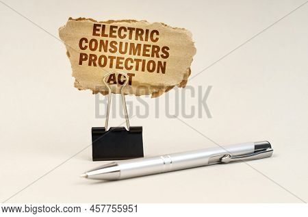 Industry And Business Concept. Next To The Handle Is An Office Clip With A Sign. On The Plate Is The