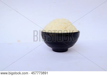 White Steamed Rice Or Nasi Putih Served In Little Bowl Isolated On White Background