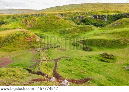 Landscape On The Isle Of Skye In Scotland. Meadows Of Fairy Glen With Central Circles On The Green. 