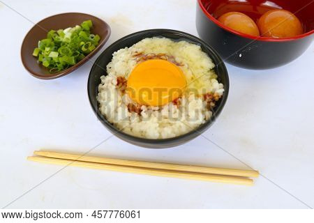 Tamago Kake Gohan Or Raw Egg On Rice. Traditional Food From Japan, Eat On Breakfast
