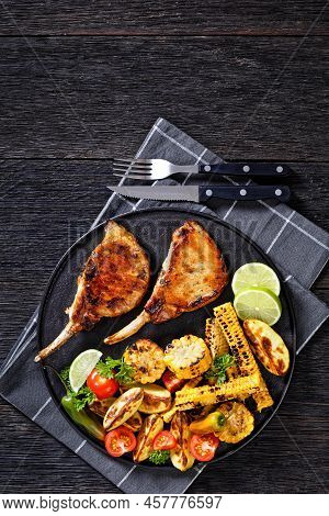 Bbq Tomahawk Pork Chops, Bone-in Steak With Grilled Corn Disks And Corn Ribs, Wedges Potatoes, Fresh
