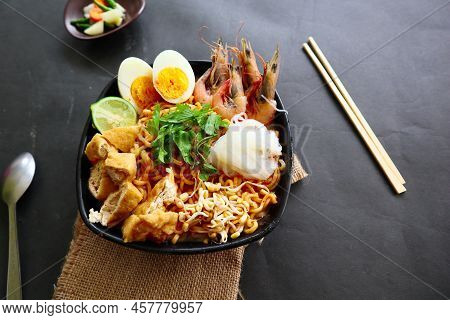 Laksa, Laksa Curry Made From Vermicelli, Noodles, Bean Sprouts, Egg, Tofu Lime, And Shrimp With A Sp