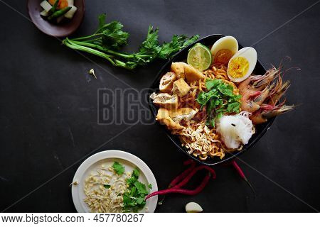 Laksa, Laksa Curry Made From Vermicelli, Noodles, Bean Sprouts, Egg, Tofu Lime, And Shrimp With A Sp