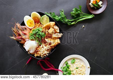 Laksa, Laksa Curry Made From Vermicelli, Noodles, Bean Sprouts, Egg, Tofu Lime, And Shrimp With A Sp