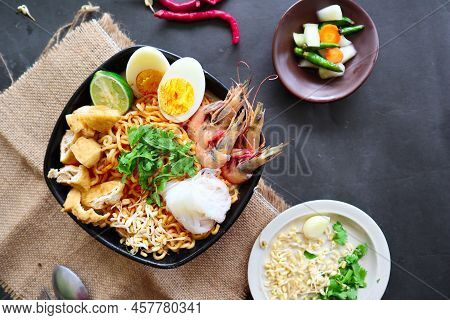 Laksa, Laksa Curry Made From Vermicelli, Noodles, Bean Sprouts, Egg, Tofu Lime, And Shrimp With A Sp
