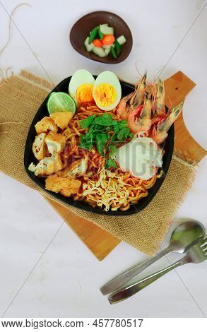 Laksa, Laksa Curry Made From Vermicelli, Noodles, Bean Sprouts, Egg, Tofu Lime, And Shrimp With A Sp