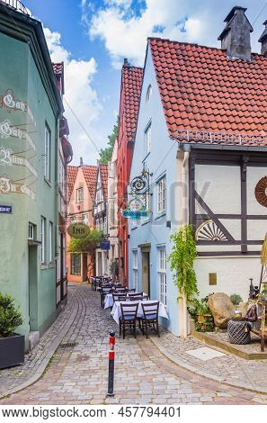 Bremen, Germany - May 18, 2022: Narrow Street With Restaurant In The Schnoor District Of Bremen, Ger