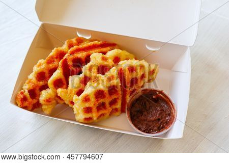 Croissant Waffle Or Croffle With Chocolate Sauce Served In Box And White Background