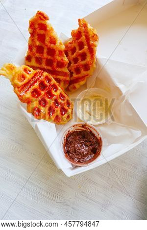 Croissant Waffle Or Croffle With Chocolate Sauce Served In Box And White Background