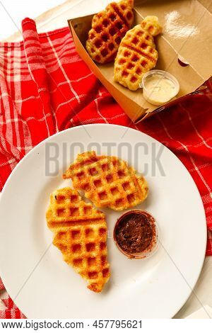 Croissant Waffle Or Croffle With Chocolate Sauce Served In Box And White Background