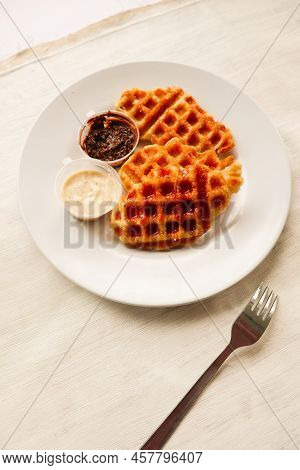 Croissant Waffle Or Croffle With Chocolate Sauce Served In Box And White Background