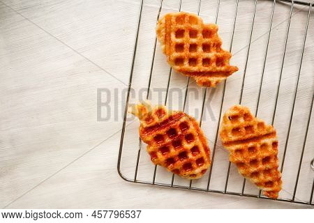 Croissant Waffle Or Croffle With Chocolate Sauce Served In Box And White Background