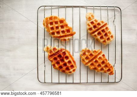 Croissant Waffle Or Croffle With Chocolate Sauce Served In Box And White Background