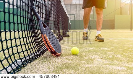Monitor Of Padel Holding Yellow Ball Near Racket With Copy Space. Racquet Sport