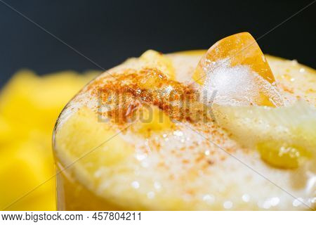 Mangonada Mexican Mango Smoothie With Chamoy Sauce And Chili Lime Seasoning And Tamarind Candy Straw
