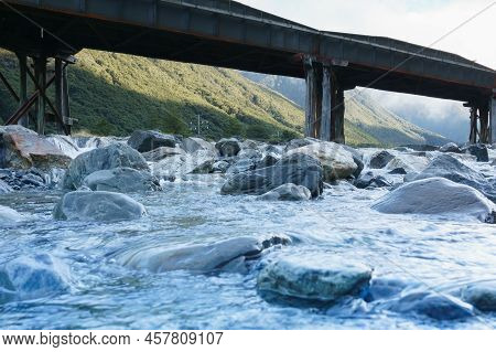 Silhouette Of Structure Of Railway Bridge Across Bealey River At Arthurs Pass, South Island New Zeal