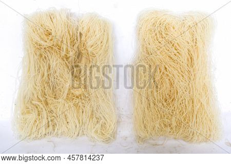 Raw Dry Bihun Or Vermicelli Or Rice Noodles Or Angel Hair Isolated On White Background