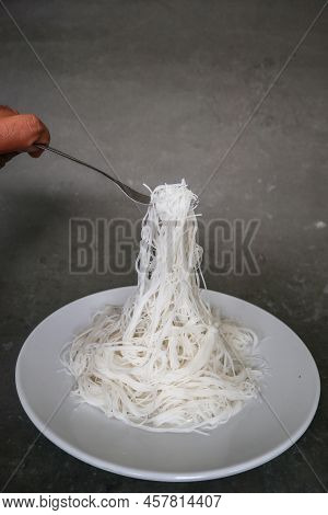 Bihun Or Vermicelli Or  Rice Noodles Or Angel Hair Isolated On Black Background