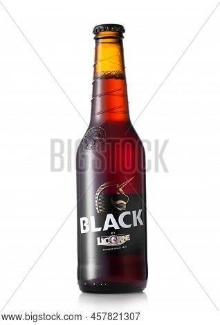 London, Uk - July 03, 2022: Bottle Of Black Licorne Dark Beer On White.