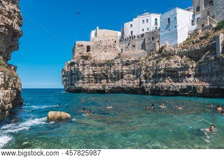 Polignano A Mare, Puglia, Italy - August 30 2021: Beautiful View Of Polignano A Mare With White Ston