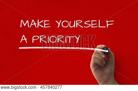 Inspirational Quote Text On Red Cover Background - Make Yourself A Priority. Inspirational Concept